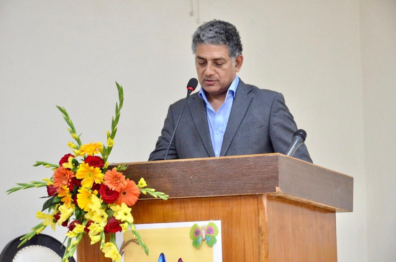 At the podium