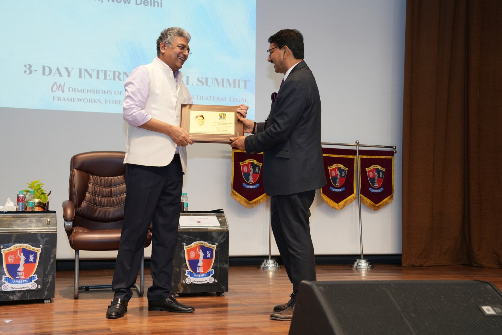 Being felicitated on stage
